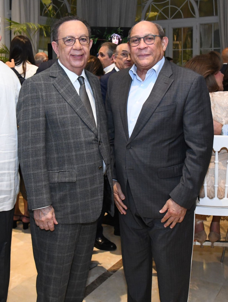 Héctor Valdez Albizu y Rafael Santos.