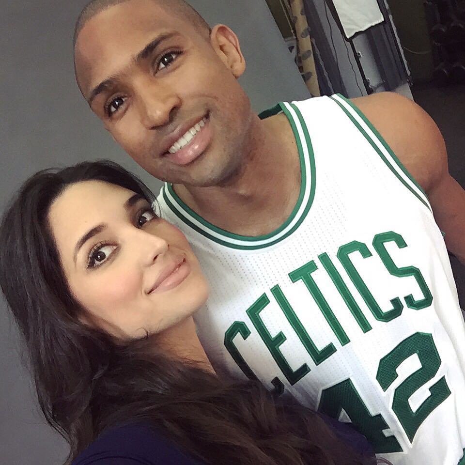 Amelia Vega y Al Horford.