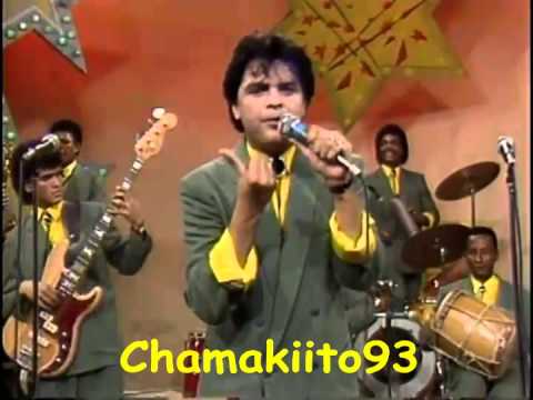 Presentacion 1987 En el show Del Mediodia Cantanto Su Exito Mas Grandes Junto A La Orquesta de Wilfrido Vargas Leo Diaz De Venezuela, Cantando El Tema De Jose Miguel Classe (El Gallito De Manati) Salvame. Desde La Producion La Musica Grabada En 1986 Creditos:Djpagoza