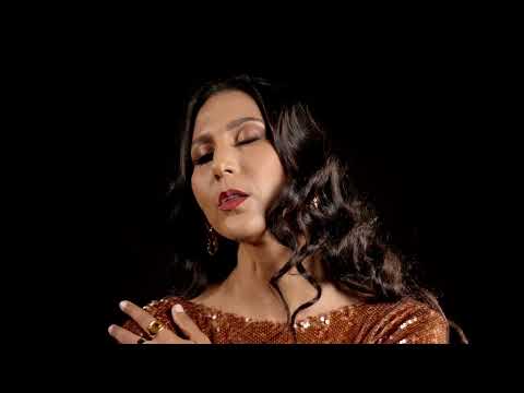 Aquí te presento el video oficial de ESCLAVO Y AMO

Directed by / Dirigido por: Andrés Ibáñez
Producer / Productor: Iván Valenzuela
DP/Director Fotografía: Luis Reynoso
Make-Up/Maquillaje: Zaira Báez
Styling/Estilismo: Natividad Bujalance
Post-production/Post-producción: Makoy

Composer / Compositor: José Vaca Flores
Produced by / Producido por: Enrique Martínez 
Music Producer Assistant / Asistente Producción Musical: Wesley Amorim 

Lead Vocals / Voz principal: Nathalie Peña-Comas

Musicians / Músicos: 

Mandola, Flamenco Guitars, Palmas and Cajón / Mandola, Guitarras flamencas, Palmas Flamencas y Cajón: Alfredo Cáceres 
Electric Guitars, Acoustic Guitars and Programming / Guitarras Eléctricas, Guitarras Acústicas y Programación:  Wesley Amorim 
Electric Bass / Bajo Eléctrico: Carlitos Del Puerto
Drums / Batería: Vinnie Colaiuta 
Percussion / Percusión: Ray Yslas
Palmas Flamencas / Palmas: Gabriela Martínez
Duduk: Pedro Eustache
Mariachi Trumpets / Trompetas De Mariachi: Javier Rodríguez 
Accordion and Pianos / Acordeón y Pianos: Enrique Martínez 

Recording Engineer / Ingeniero de Grabación: 
John Leftwich | Left Way Studio, Studio City, CA 

Mixing and Masterization / Mezcla y Masterización: 
Jean B. Smit | Got2mix Studios, Los Angeles, CA

© 2026 PCM Production LLC